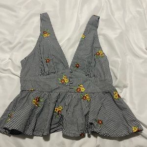 Flower flare zip deep v tank top